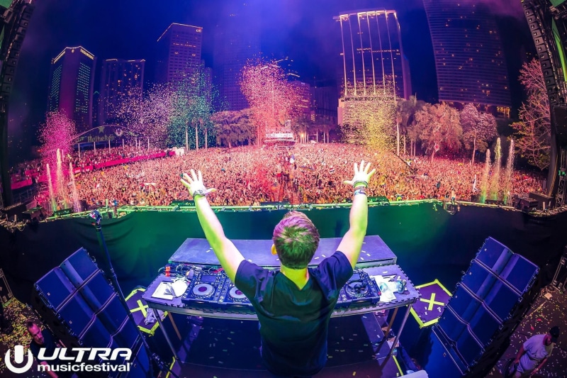 crew, night, shirt, real people, concerts, nature, music, communication, one person, sitting, Robbert van de Corput, neck, water, arms raised, DJ, lifestyles