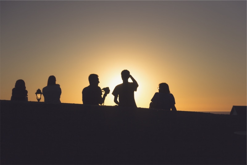silhouette, outdoors, person, adults only, real people, orange color, togetherness, sky, people, friends, nature, standing, clear sky, women, adult, copy space