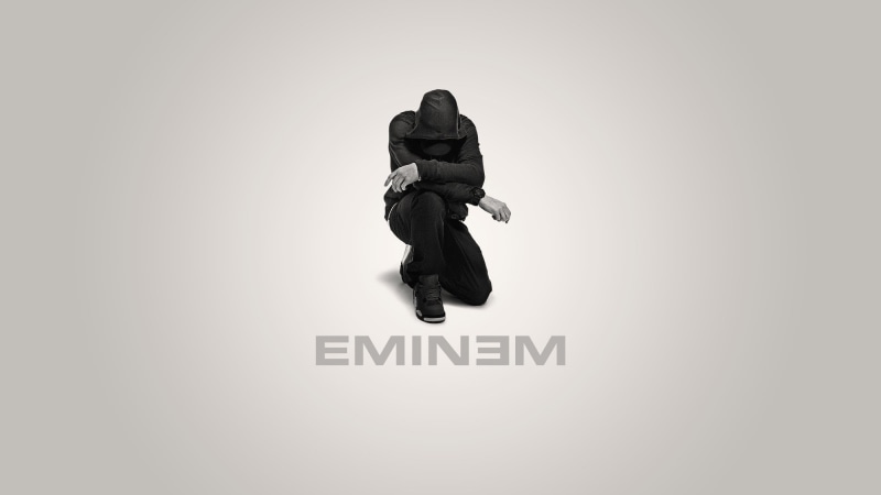 western script, cut out, text, music, male likeness, mid-air, studio shot, 1080P, indoors, sign, full length, warning sign, representation, rapper, eminem