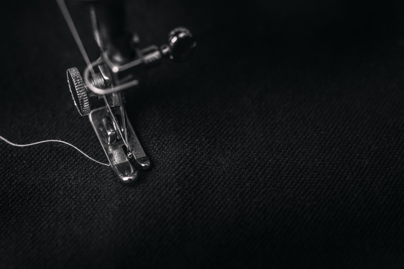 black and white, single object, day, musical instrument, indoors, close-up, thread, still life, lock, cloth, Sewing machine, technology, photo, metal, extreme close-up