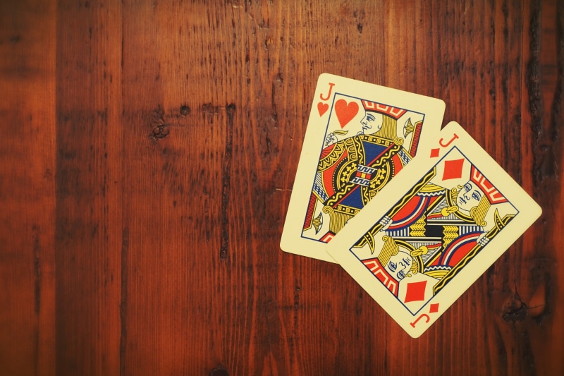 gambling, surface, table, human representation, heart, no people, brown, jacks, 5K, nostalgia, playing, label, poker, letter, paper, cards, western script