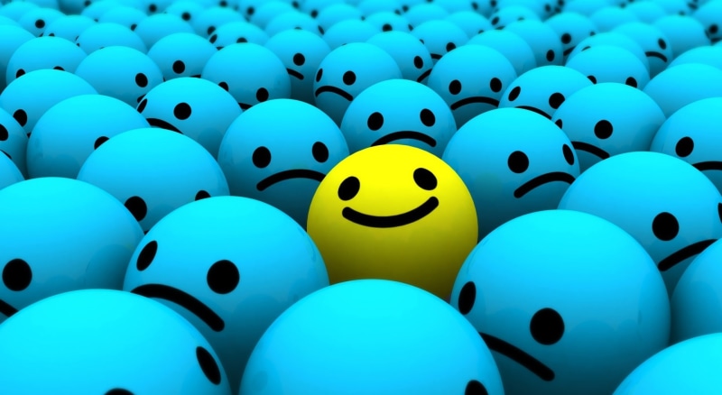full frame, anthropomorphic smiley face, no people, high angle view, indoors, be different, multi colored, crowd, sphere, large group of objects, selective focus