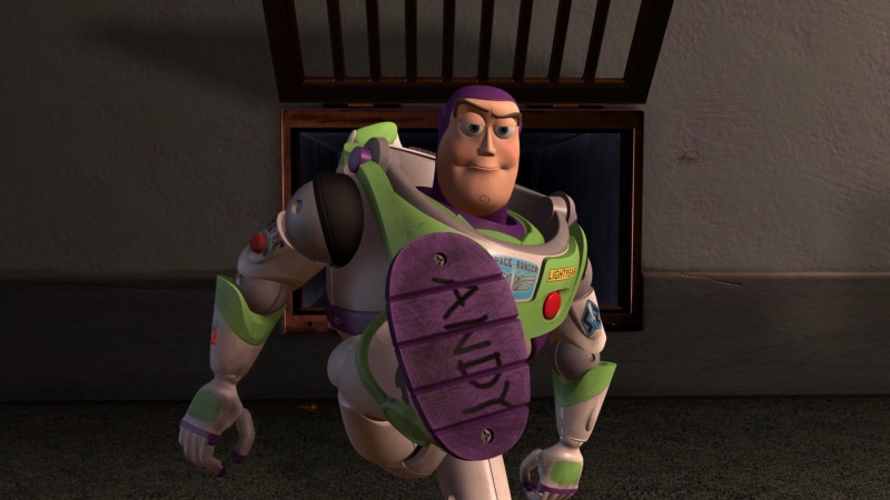toy, buzz, one person, looking at camera, hairstyle, story, Toy Story, full length, leisure activity, clothing, real people, sitting, young adult, indoors