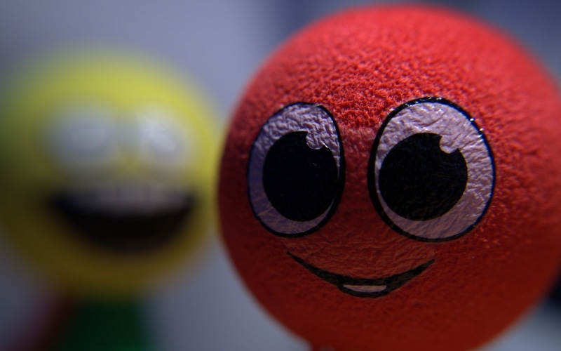 ball, smiley, 2K, iris - eye, multi colored, no people, close-up, eye, extreme close-up, body part, selective focus, macro, bird, one animal, emoji, sport