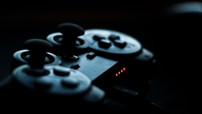 2K, electrical equipment, relaxation, indoors, control, obsolete, no people, PlayStation 3, macro, black, selective focus, blue, arts culture and entertainment