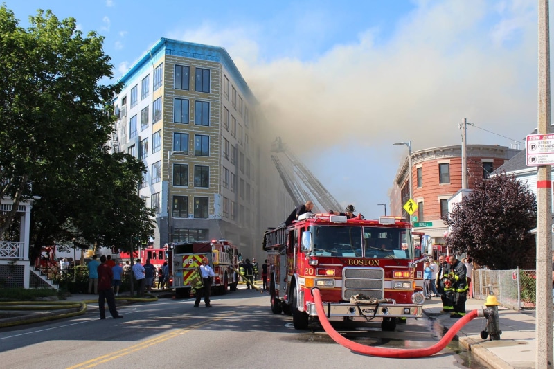 near, Emergency, sky, Fire, Hose, plant, building, group of people, mode of transportation, firetruck, City, fireman, city street, alarm, Building, firefighter