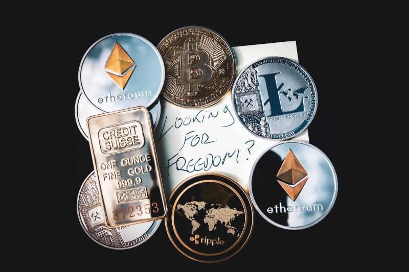 western script, black background, dom concept, group of objects, assets, metal, gold, virtual, 5K, directly above, digital assets, coin, money, ethereum
