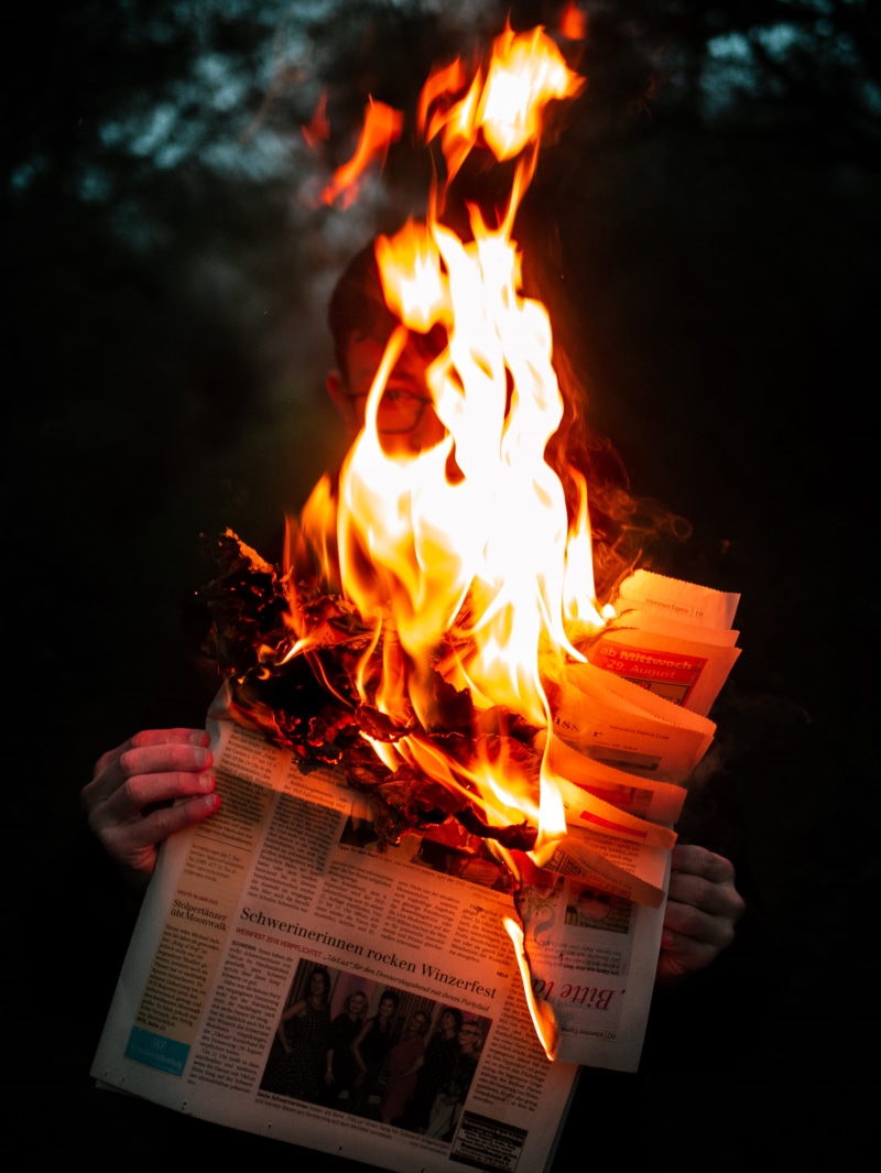 unrecognizable person, pac man, real people, paper, one person, food, person, hearth, forest, mystic, heat - temperature, fire, log, electronics, burn