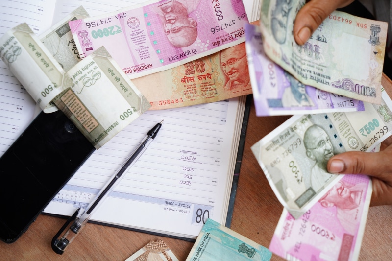 paper currency, finance and economy, contract, rupee, people, letter - document, paper, borrowing, 5K, currency, business, furniture, banking, indoors