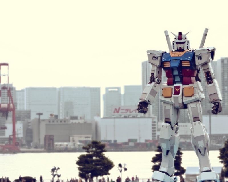 built structure, sky, Mobile Suit Gundam, building, clear sky, full length, 720P, focus on foreground, building exterior, skyscraper, futuristic, Gundam