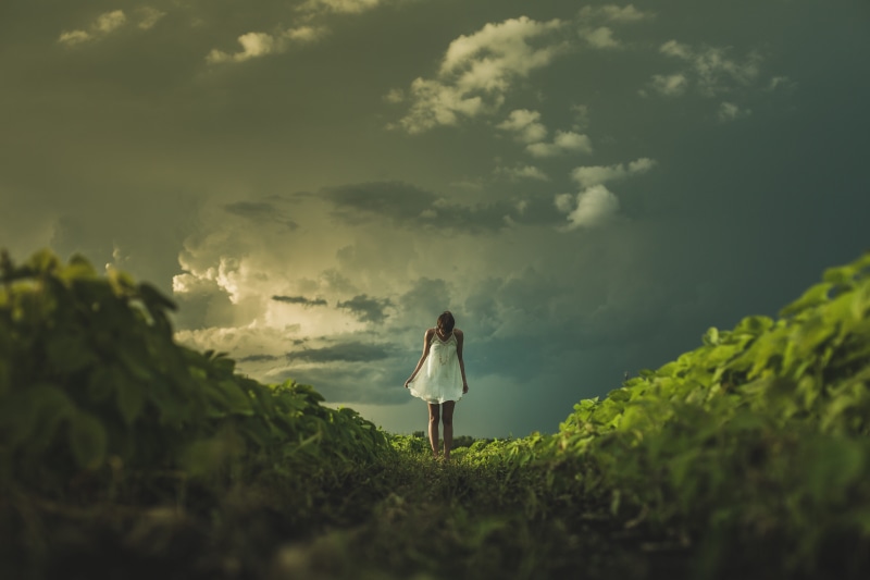 lifestyles, land, dress, people, full length, woman, cloud - sky, wearing, walking, day, caucasian Ethnicity, real people, standing, field, green color