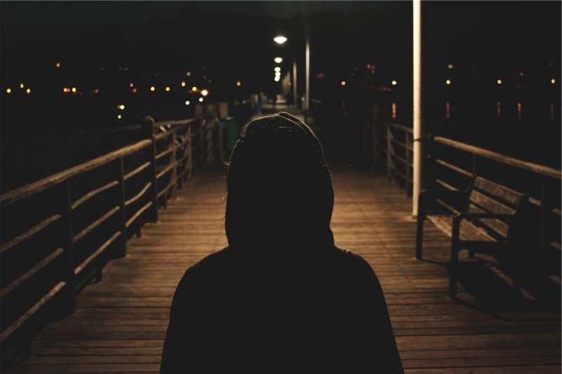 architecture, leisure activity, hoodie, railing, adult, night, seat, bridge, dark, outdoors, real people, built structure, 1080P, indoors, silhouette