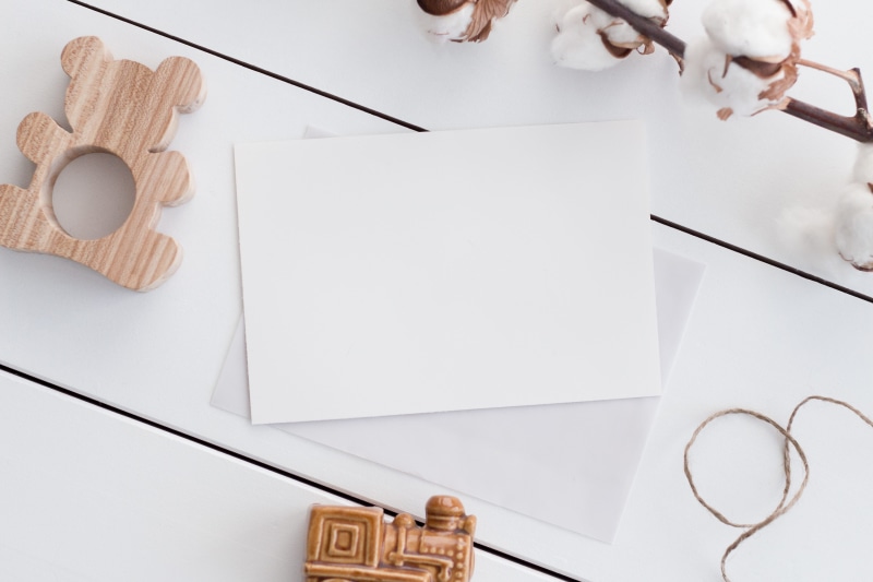 rustic, people, paper, indoors, creativity, layout, simple, card, blank, toy, high angle view, gift, wooden, mockup, composition, art and craft, holding