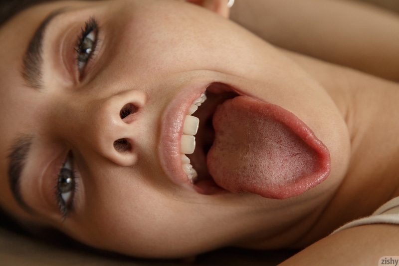 facial expression, open mouth, human body part, positive emotion, tongue out, eyebrows, Araya Acosta, human mouth, human face, child, portrait, relaxation