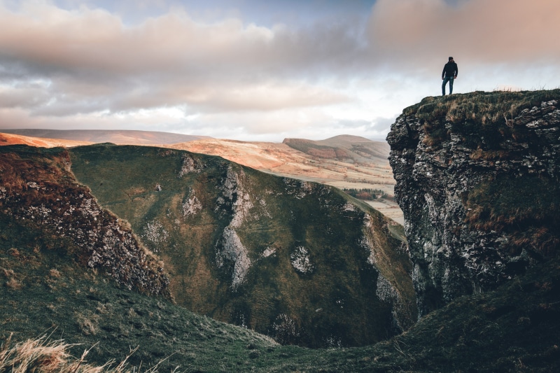 full length, environment, rock - object, sky, mountain, mountain range, 5K, nature, scenics - nature, leisure activity, solid, hill, rock, man, outdoors