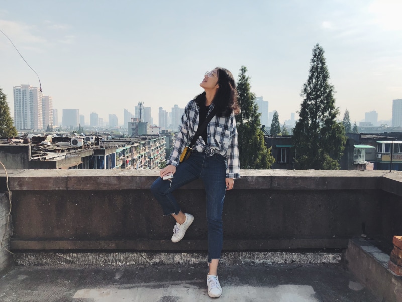 architecture, day, nature, hair, dock, one person, town, city, sitting, urban, beautiful woman, built structure, lifestyles, standing, real people, woman
