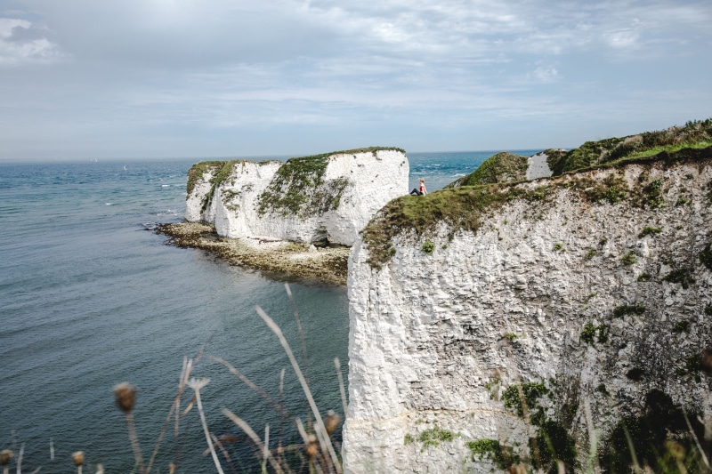 person, male, cliffs, cloud - sky, man, cliff, top, sea, old harrys rock, tranquility, outdoors, nature, ledge, rock, ocean, horizon, white, no people