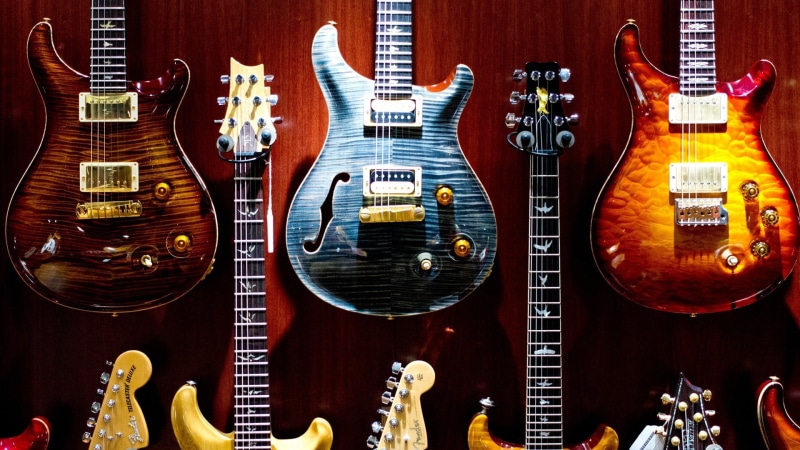 arts culture and entertainment, acoustic guitar, retail, electric, assorted, electric guitar, wood - material, string instrument, indoors, 1080P, musical instrument string