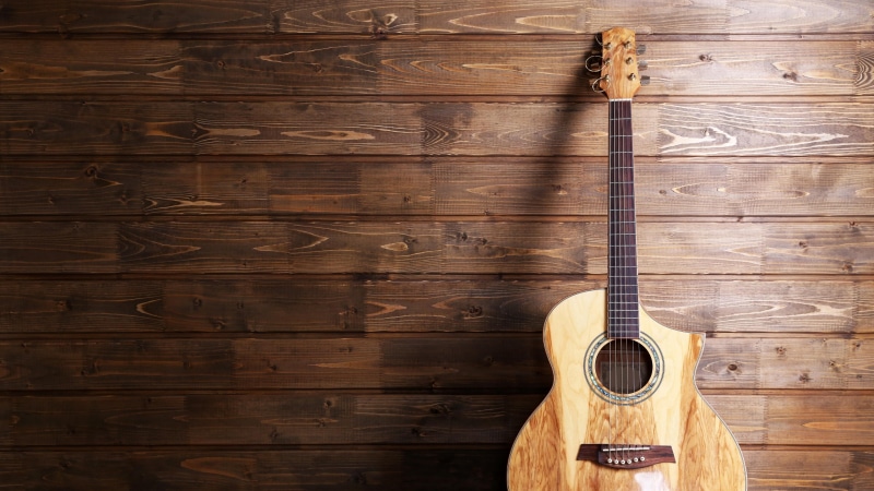 wood - material, wall - building feature, musical instrument, arts culture and entertainment, home interior, brown, backgrounds, guitar, wood, indoors