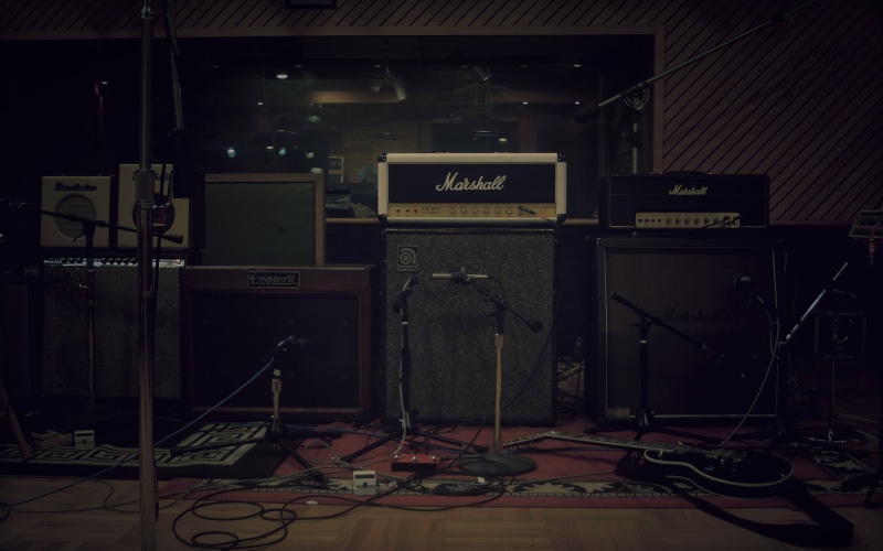 western script, instrument, music, input device, choice, amplifier, musical instrument, musical, communication, stage, cable, microphone, electrical equipment