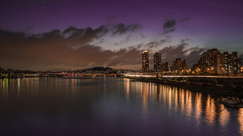 night scenery, night, reflection, built structure, sunset, magic hour, a night view of seoul, outdoors, travel destinations, street lights, modern, chapter impressions
