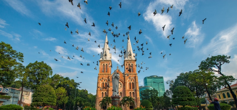 christianity, cloud - sky, vietnam, low angle view, building exterior, Notre-Dame Cathedral Basilica of Saigon, plant, tower, building, outdoors, sculpture