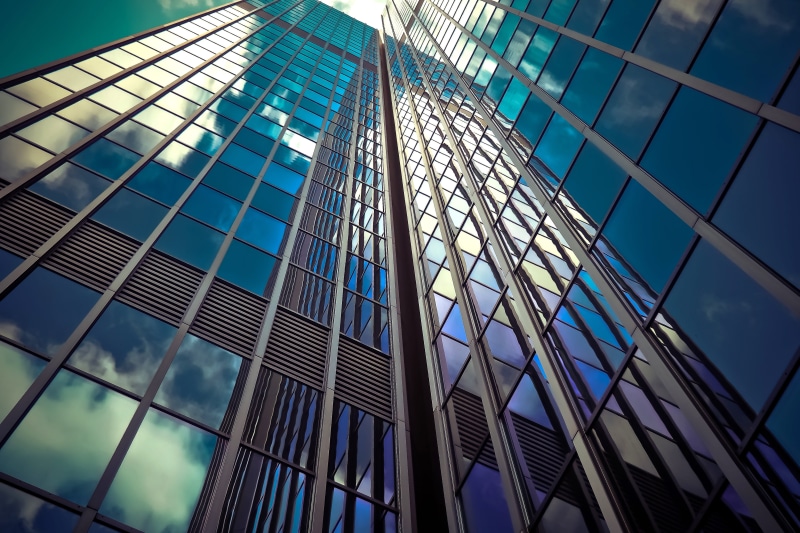 built structure, office building exterior, office, modern, skyscraper, glass front, clouds, skyline, modern high rise building, no people, downtown, view