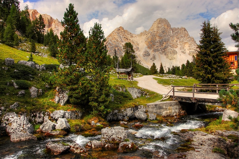 green, travel Destinations, non-urban scene, mountain, solid, trees, holiday, mountain Range, lake, tranquil Scene, Mountains, no people, tranquility, rock - Object