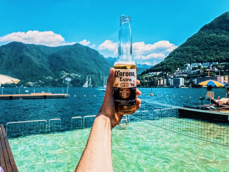 scenics - nature, daylight, beer bottle, ocean, mountains, sky, outdoors, summer, communication, bottle, architecture, swimming, travel, corona, recreation