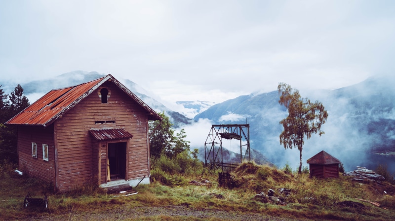 lift, sky, mountain, non-urban scene, building, log cabin, clouds, architecture, built structure, 5K, nature, wooden, no people, house, abandoned, plant