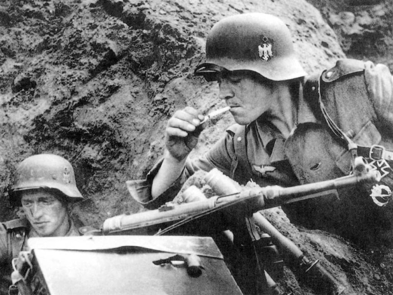 people, headwear, history, World War II, armed forces, monochrome, outdoors, real people, 480P, war, military, military uniform, gun, helmet, MP 40, day