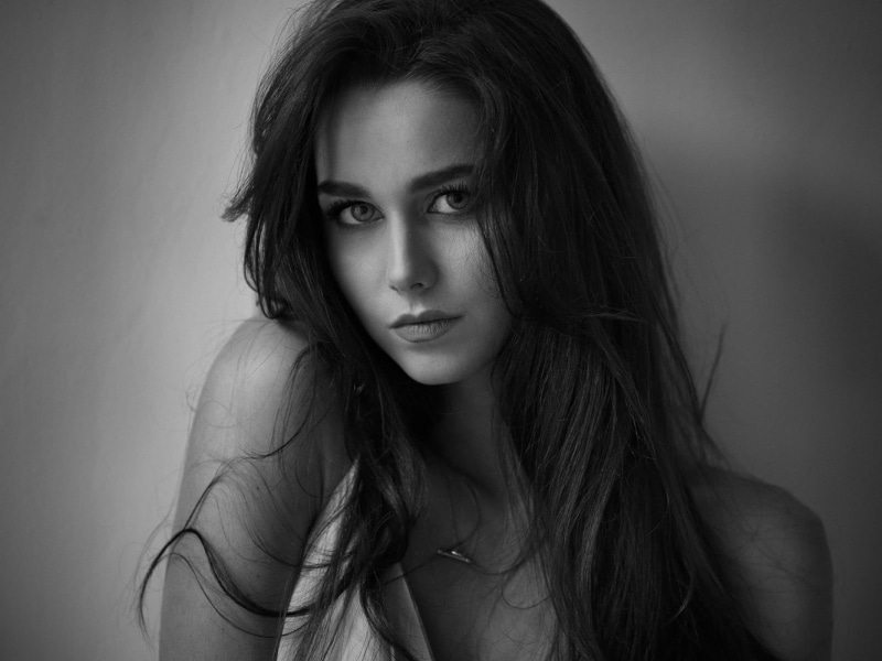adult, front view, looking at viewer, hair, women, indoors, human hair, contemplation, wavy hair, beautiful woman, teenager, human face, long hair, looking at camera
