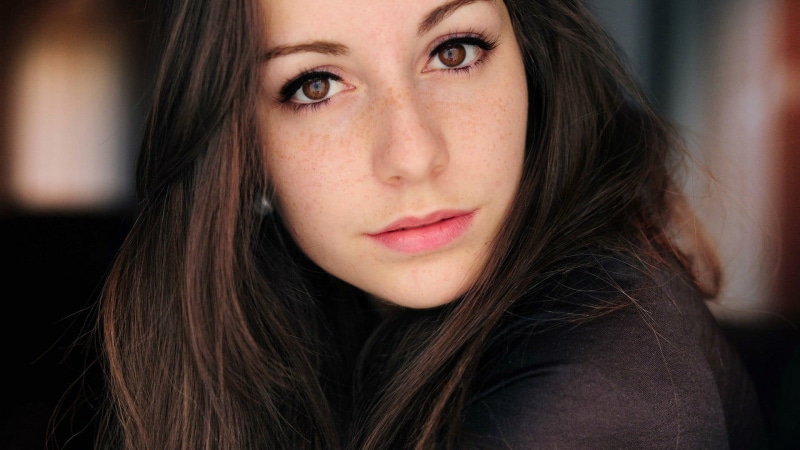 face, young women, beautiful woman, brunette, portrait, contemplation, adolescence, focus on foreground, young adult, brown hair, hairstyle, black, close-up