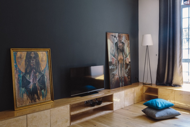 paintings, mirror, interior, female likeness, day, no People, window, hardwood floor, home Interior, creativity, craft, indoors, frame, picture frame, brick walls
