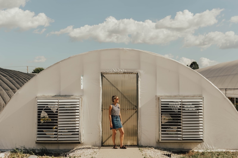 built structure, daytime, blue sky, behind, casual clothing, half, cloud, 5K, one person, young adult, leisure activity, standing, tank, adult, architecture