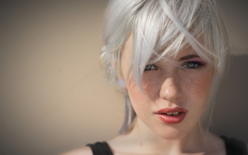 body part, model, looking at camera, woman, freckles, beauty, haired, depression - sadness, blond hair, young adult, portrait, white hair, hairstyle, indoors