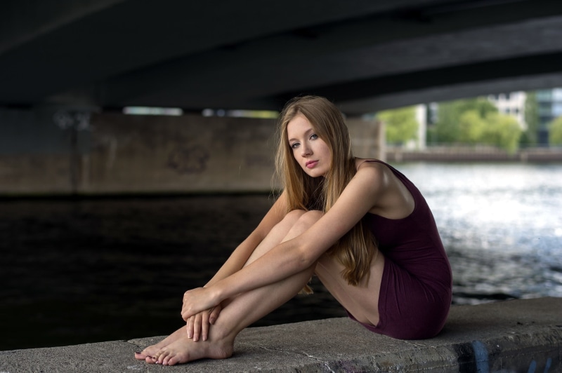 model, women, young adult, focus on foreground, leisure activity, portrait, real people, full length, looking, day, sitting, beautiful woman, one person