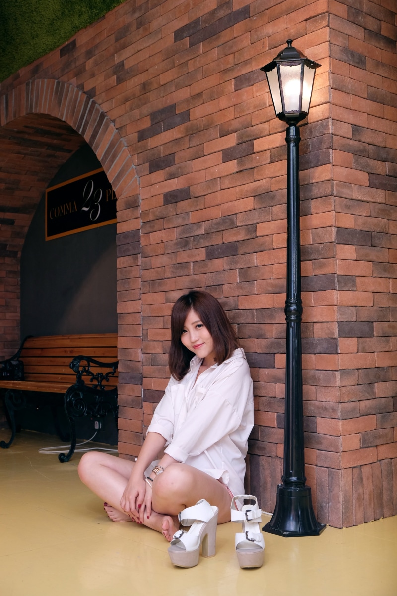 adult, lighting equipment, electric lamp, hairstyle, indoors, smiling, toes, Asian, 4K, portrait, sitting, full length, casual clothing, one person, happiness