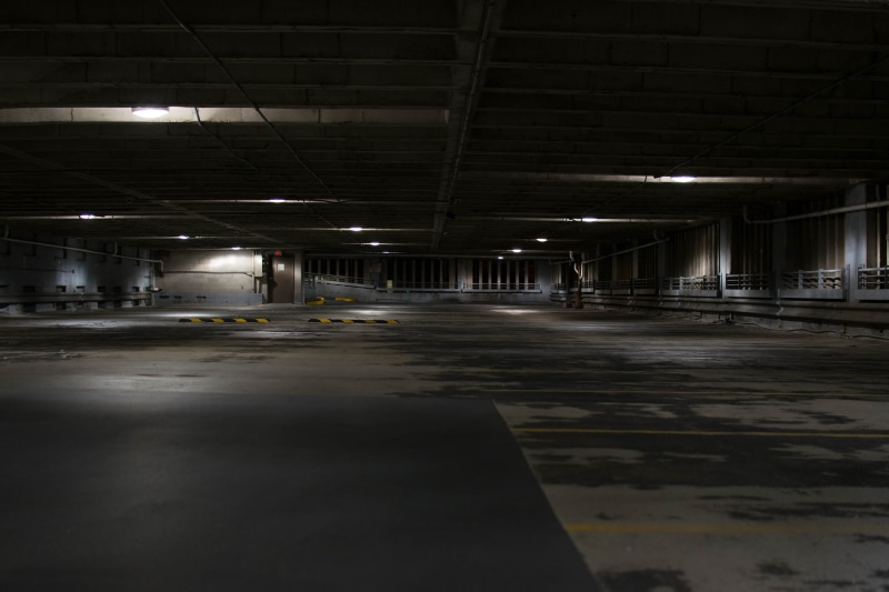 no People, building, illuminated, built structure, parking Lot, concrete, indoor, parking, dark, industry, ceiling, road, architectural column, lot, basement