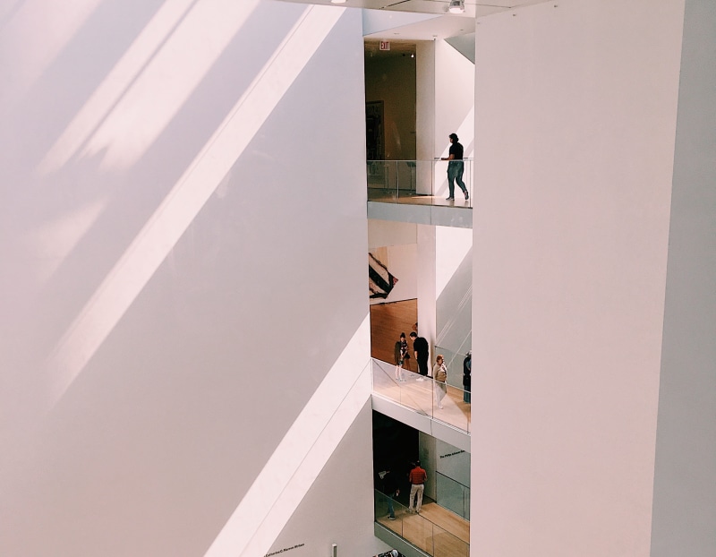 2K, sunlight, staircase, flooring, women, shelf, men, window, 11 w 53rd st, furniture, modern, indoors, interior design, clothing, people, floor, outdoors