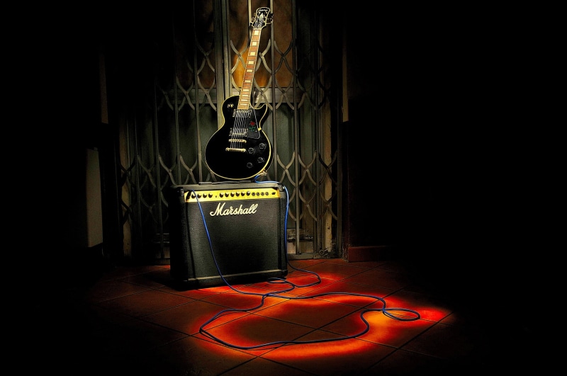 black background, light, connection, electrical equipment, communication, technology, illuminated, guitar, electricity, stage, arts culture and entertainment