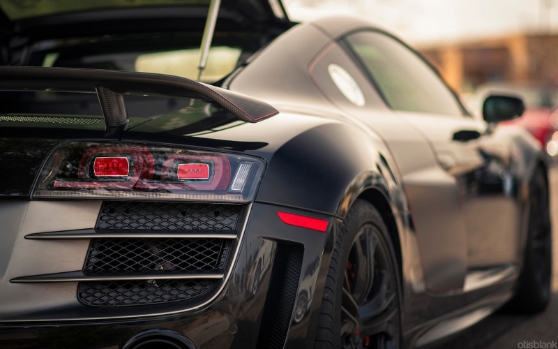 day, no people, close-up, outdoors, motor vehicle, retail, focus on foreground, 1080P, transportation, vehicle, travel, r, speed, wheel, coupe, city, auto racing