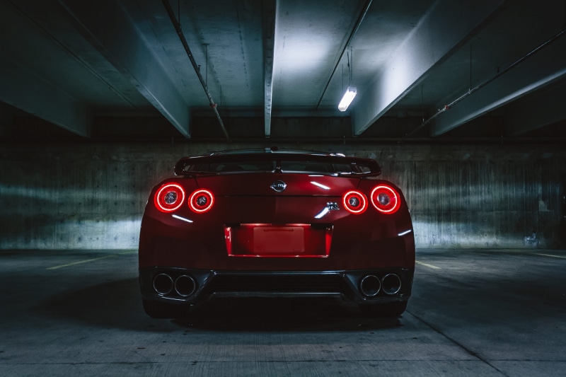 closeup, adventure, no people, car, transportation, motor racing track, parking garage, competition, gtr, indoors, r, sports, nismo, illuminated, urban