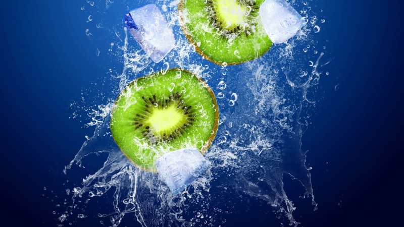 green color, studio shot, fruit, slice, motion, 2K, food and drink, kiwi (fruit), blue, kiwi, splashes, freshness, close-up, water, wellbeing, healthy lifestyle