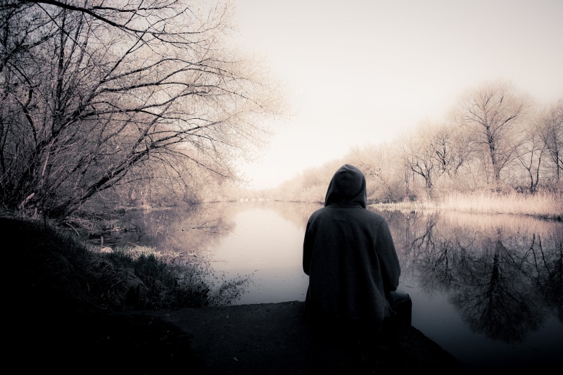 water, tree, sadness, the silhouette, gray, the emotion, reflection, one person, tranquility, nature, solitude, male, mood, expect, adult, tranquil scene
