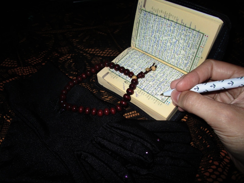 culture, translation, holding, reading, ramadan, human body part, scripture, prayer, connection, sacred, arab, write, real people, karim, finger, rosary