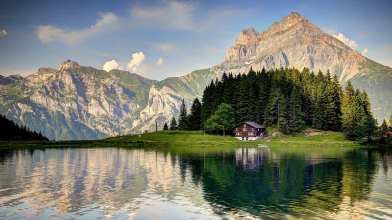 idyllic, beauty in nature, tranquility, tranquil scene, day, non-urban scene, reflection, sky, tree, no people, mountain range, water, waterfront, mountain