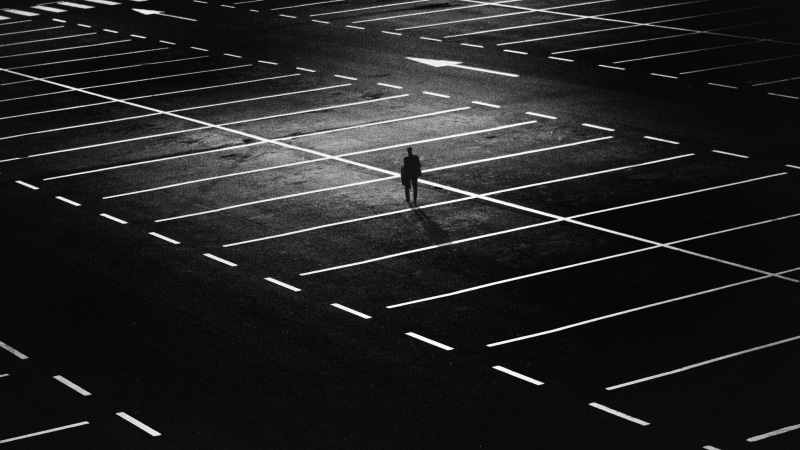 solo, parking, shadow, sunlight, lot, parking lot, transportation, road marking, men, pattern, high angle view, day, night, man, real people, road, black-and-white