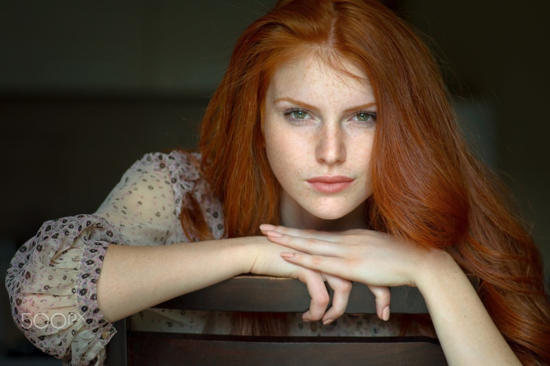 women, beauty, long hair, young women, indoors, model, black background, lifestyles, adult, front view, redhead, real people, looking at camera, face, green eyes