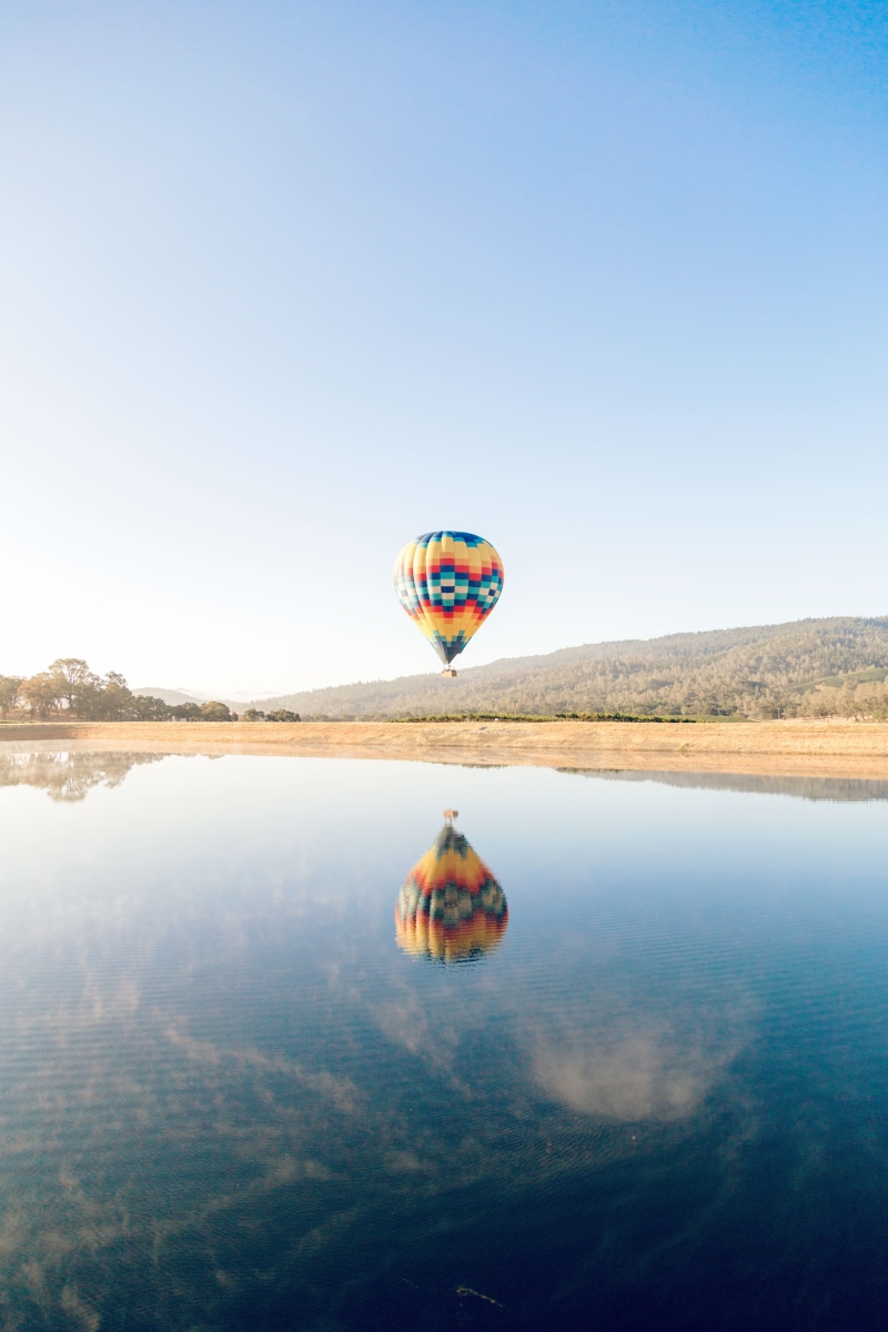 waterfront, transportation system, clear sky, aircraft, hot, tranquil scene, parasailing, recreation, landscape, 5K, daylight, water, reflection, calm